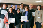 At the Leadership Symposium in October 2006, the NAA recognized outstanding alumni clubs, represented by, front row, from left, Melissa Kopolow (C96), NU Club of Washington, D.C.; Vidya Battu (McC01), NU Club of Atlanta; Tara Brown (WCAS97), NAA regional director; Betty Pak (WCAS99), NU Club of Atlanta. Back row, from left, Joshua Katzman (McC98), NU Club of Los Angeles; Michelle Madigan (J02, GJ03), NU Club of Greater New York; Roger Fong (KSM91), NU Club of Virginia; and Cliff Garstang (WCAS75), NU Club of Virginia.