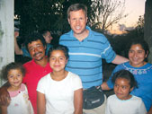 Charles Hardwick, who is fluent in Spanish, visits a family in Monjas, Guatemala, to bless their new home. He spent 10 days in Guatemala building an orphanage with a church mission group.