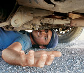 Dominic Frank puts his mechanical engineering degree to good use on the adventure. Somewhere in Russia, Frank crawled under the car to fix a cracked exhaust pipe with tin cans and hose clamps. Frank says he ate a lot of canned corn that day.