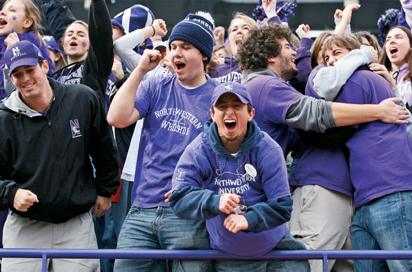 Wildcat football fans rejoice during a first-half scoring drive.