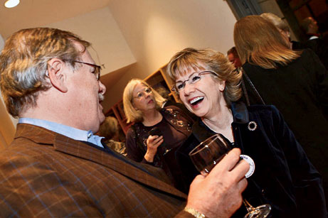 Susan Snider Osterberg (C66) catches up with a friend at the 40th party.