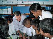 John Wood with students at the opening of Room to Read’s 1,000th Reading Room, in Siem Reap, Cambodia.