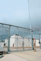U.S. security forces guard the main entrance to Camp 6, the new maximum security facility at the U.S. Naval Station in Guantánamo Bay, Cuba.