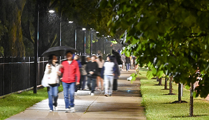students walking at night