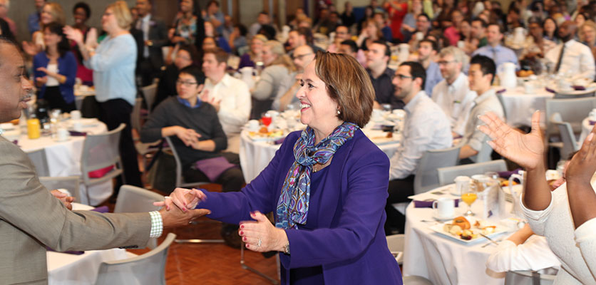 Patricia Tells Irvin at one of her VP Breakfasts with staff