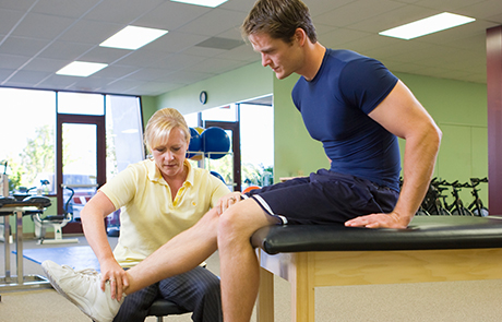 northwestern-medicine-physical-therapist-working-on-patient.jpg