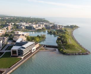 Ariel view of the Evanston campus. Lake Michigan on the right and the campus on the left.