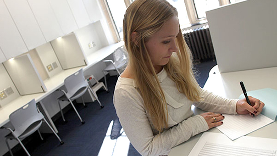 student studying on campus