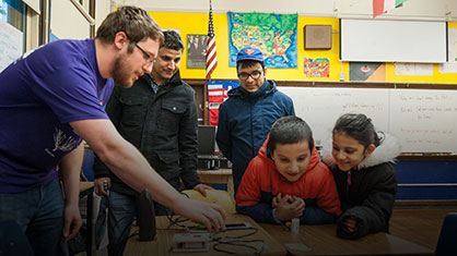 student volunteering with children